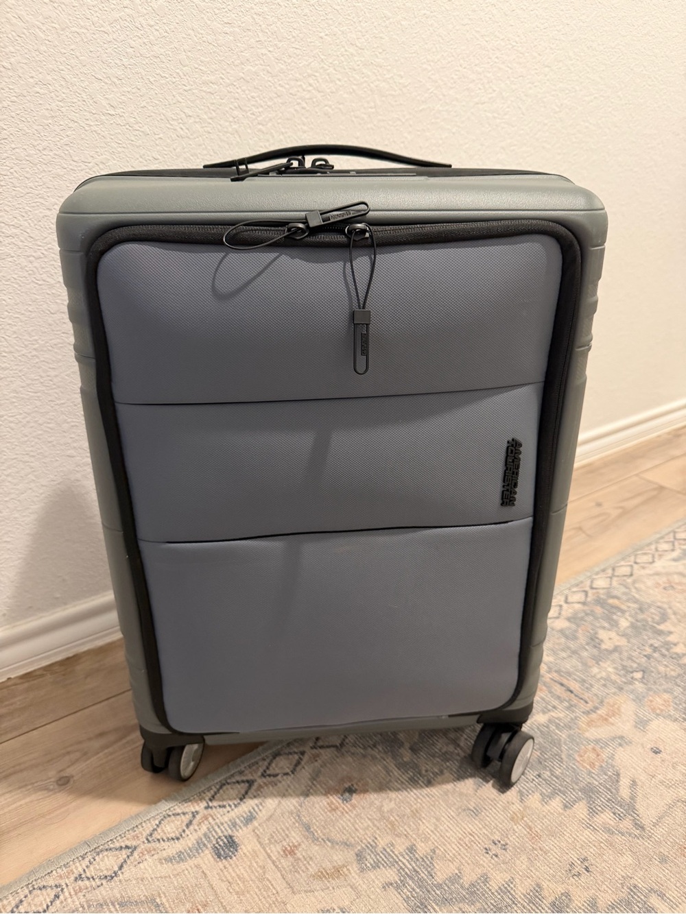 American Tourister Light Gray Softshell Carry-On Spinner
